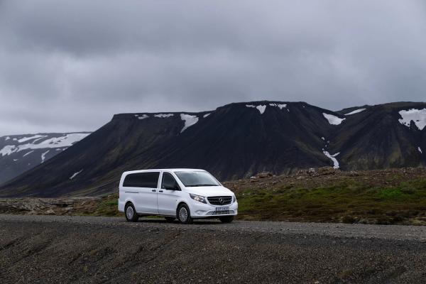 Mercedes Benz Vito Rental Car A luxurious Mercedes Benz Vito, a premium option for car hire in Iceland, parked amidst the picturesque Icelandic scenery