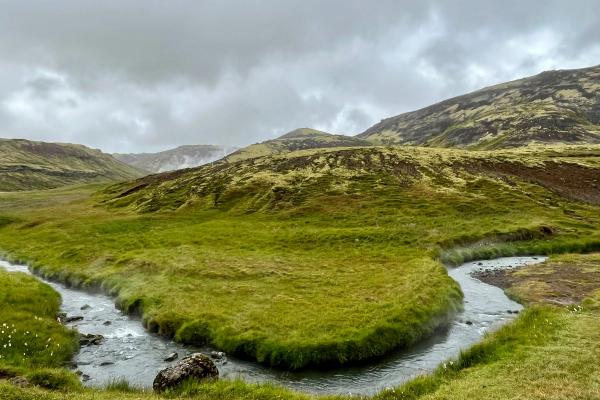 Hot river on a green valley