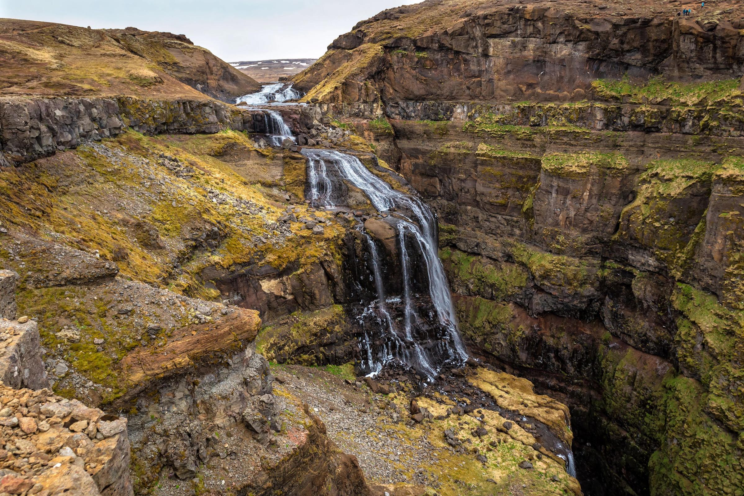 Panoramic view on the waterfall Glymur 