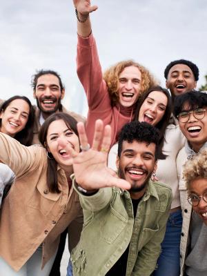 Happy people in Iceland thanks to the security of the country Big group of cheerful people, looking at the camera smiling and taking a selfie