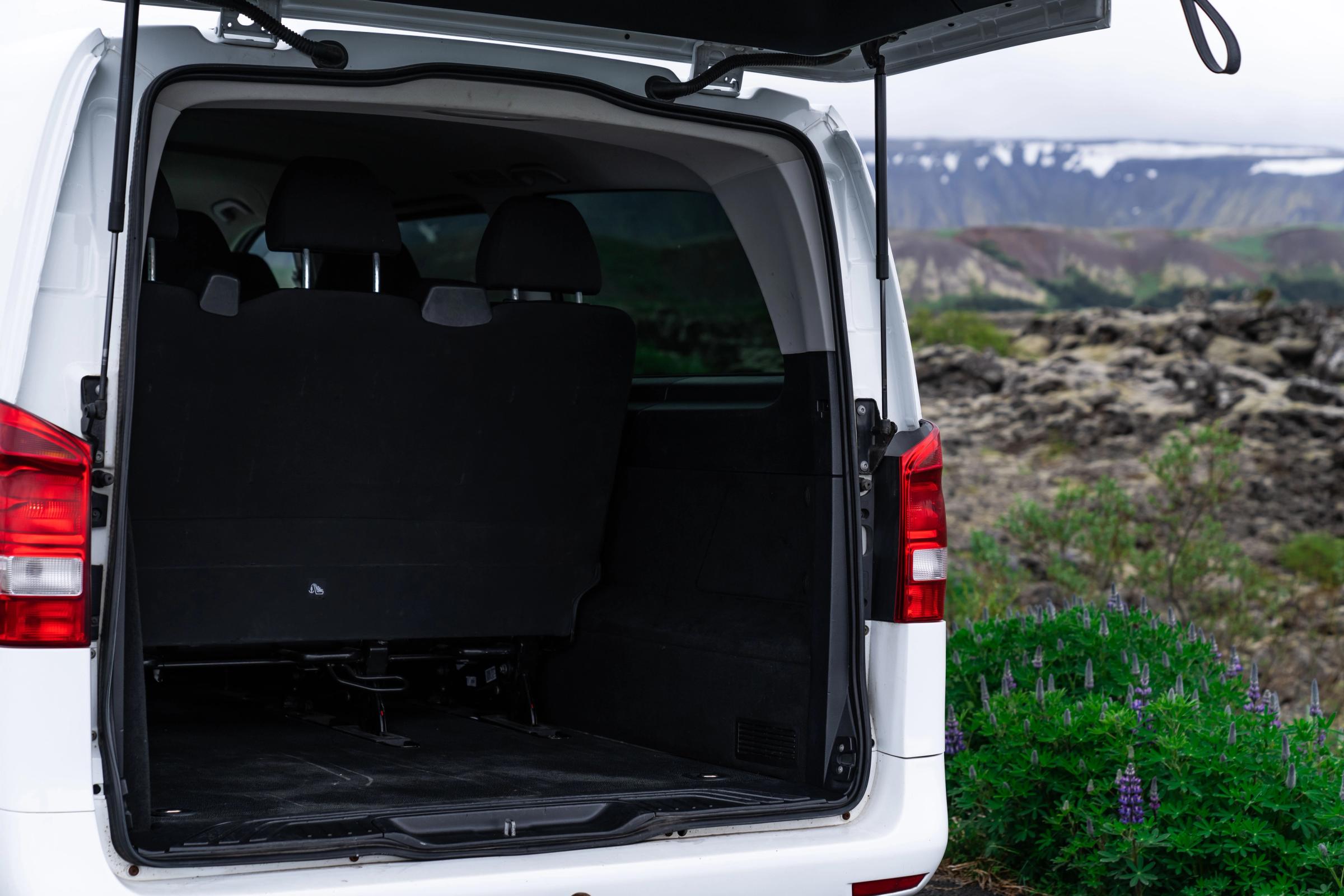 Mercedes Benz Vito rental car interior with plush seats and ample storage space