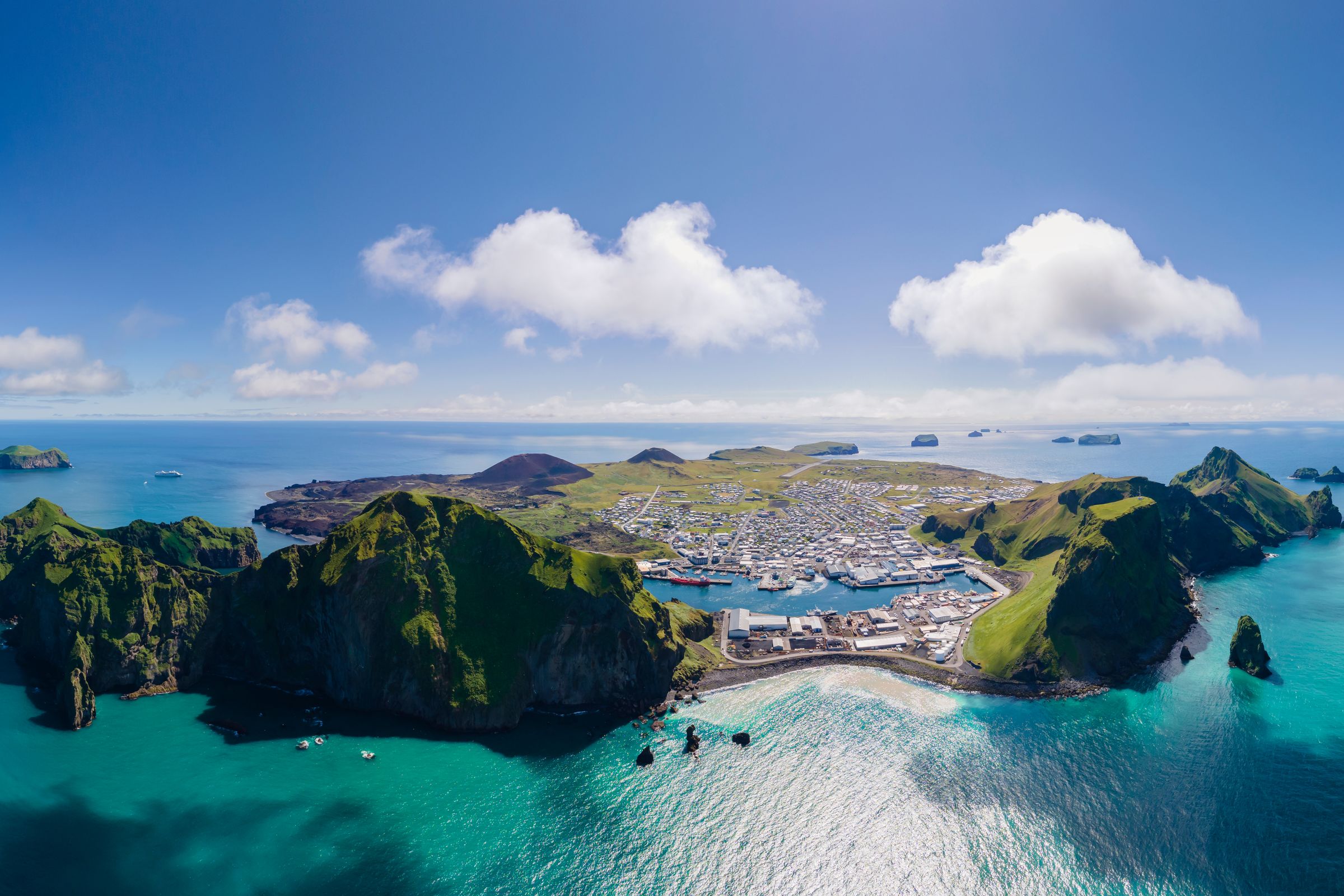 an archipelago surrounded by beautiful clear blue water