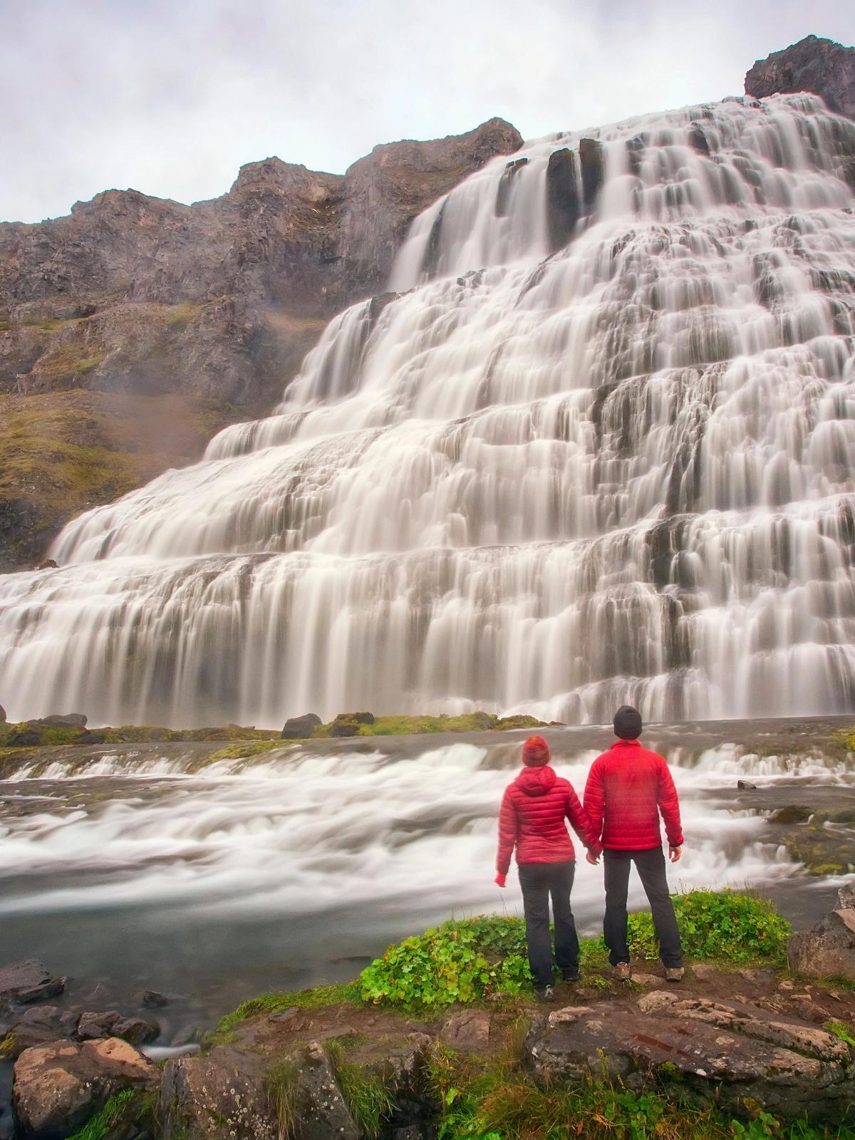 Couple at Dynjandi waterfall, Iceland