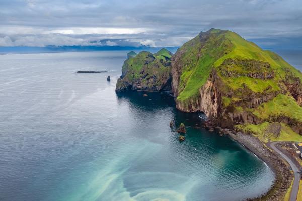 an aerial view of a small island in the middle of the ocean .