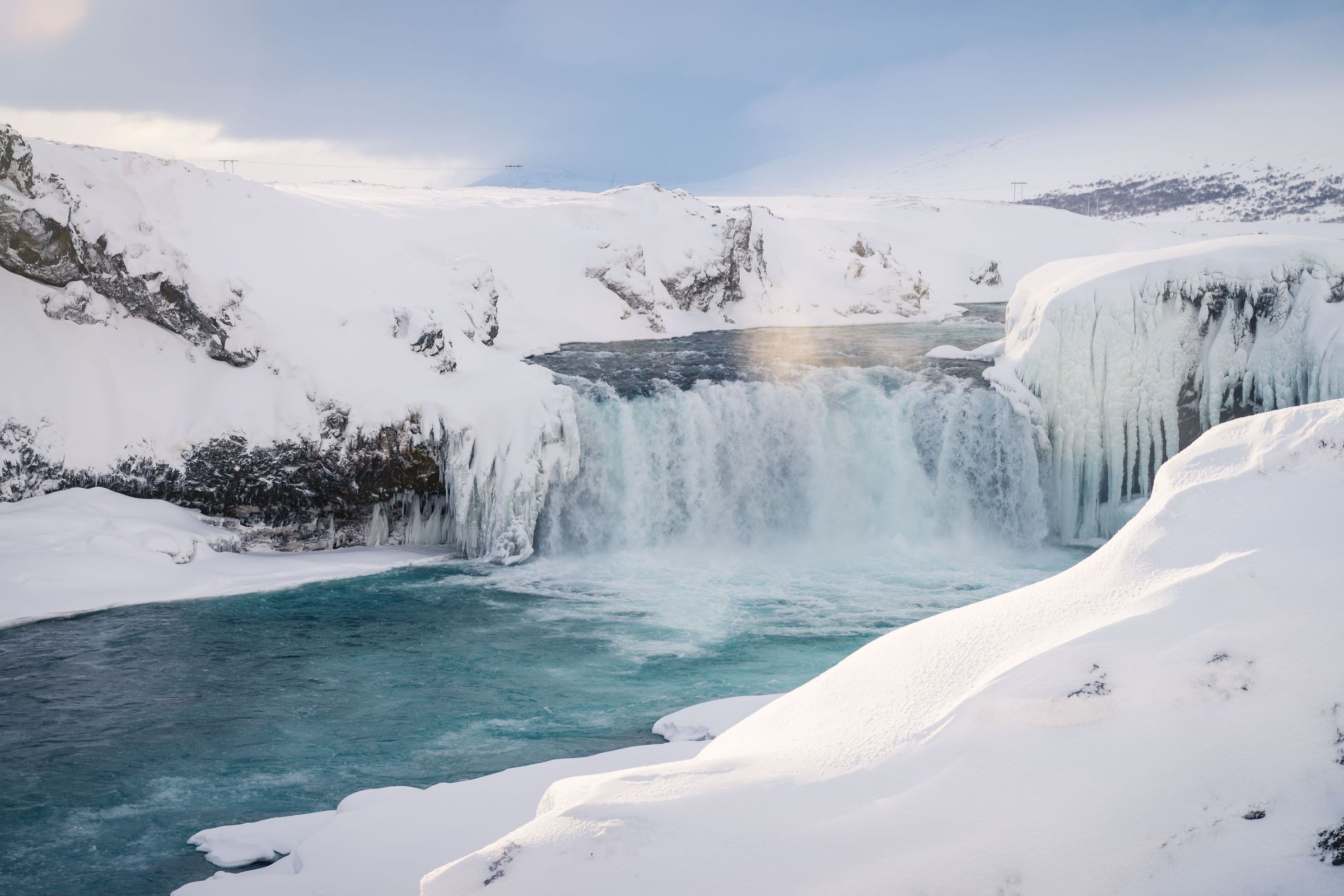 Godafoss A picture of godafoss waterfall with snow during a warm day. Amazing experience for anyone coming to iceland.