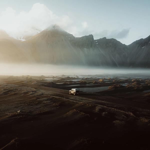 aerial of a car in an Icelandic road