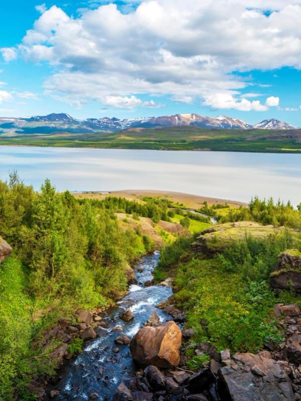 Water course falling down to Lagarfljot lake in Eastern Iceland