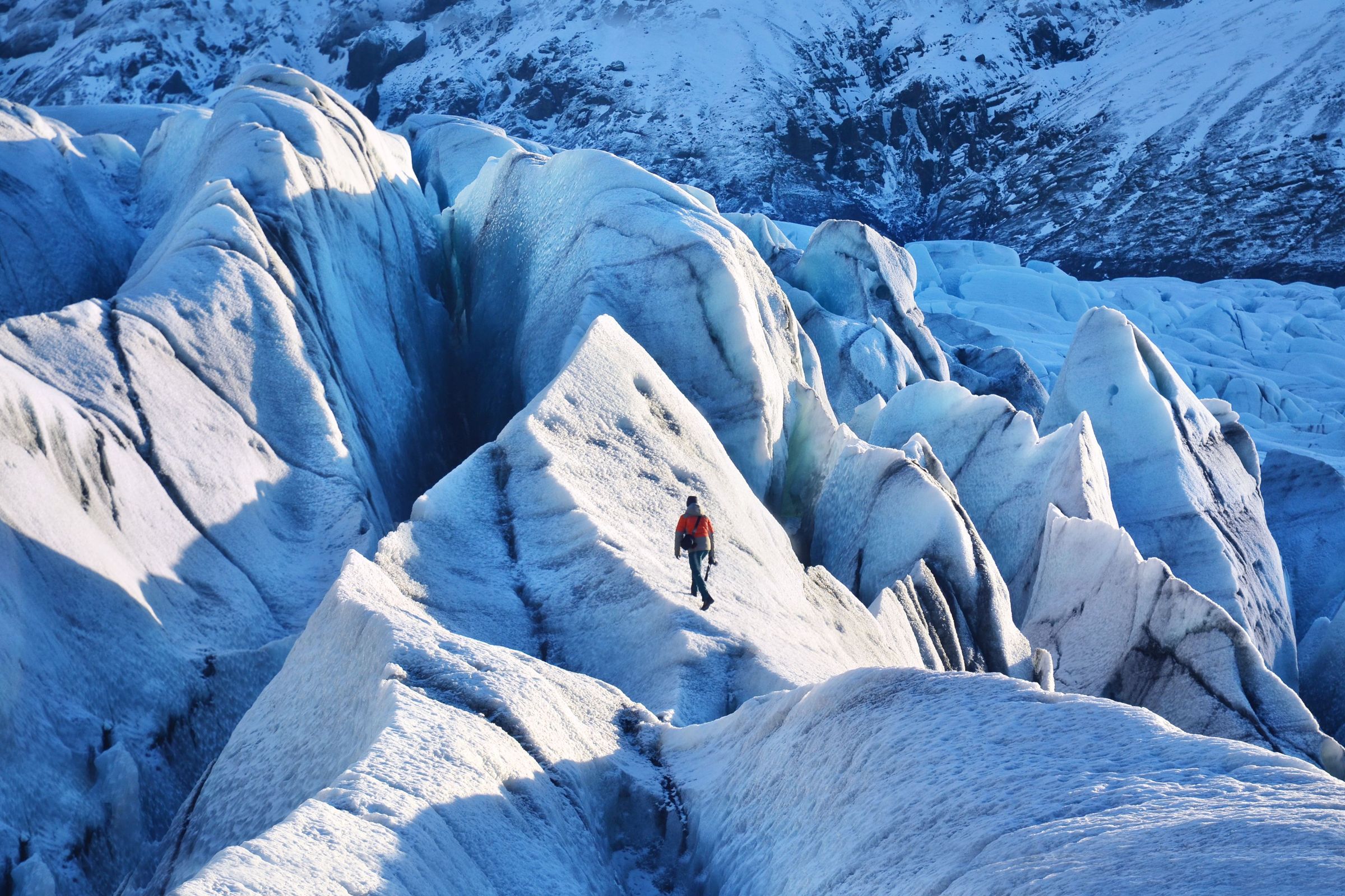 Man doing ice climbing in Iceland