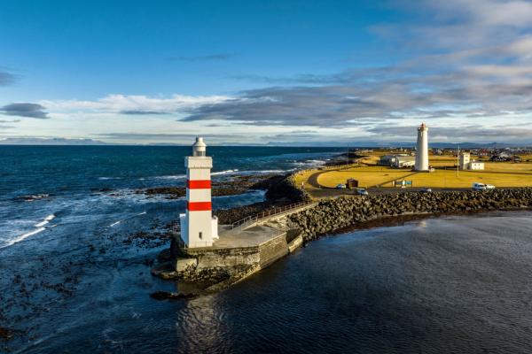 View on Garður Old Lighthouse, Iceland Panoramic view on Garður Old Lighthouse, surrounded by the ocean