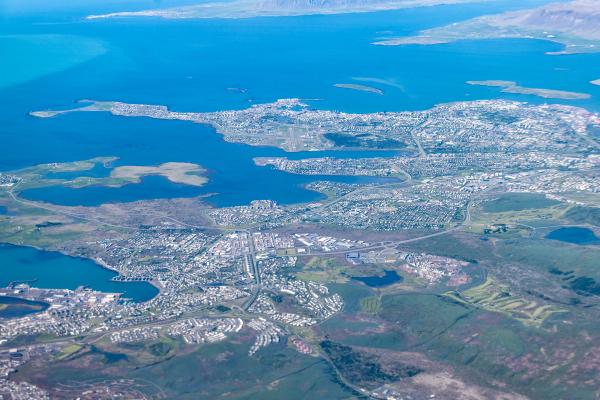 aerial view of a coastal city on a sunny day