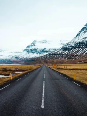 Part of the Iceland Ring Road with snowed mountains