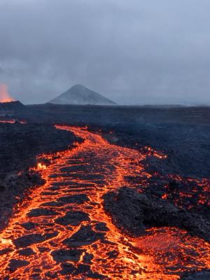 a volcano is erupting and lava is coming out of it, Iceland