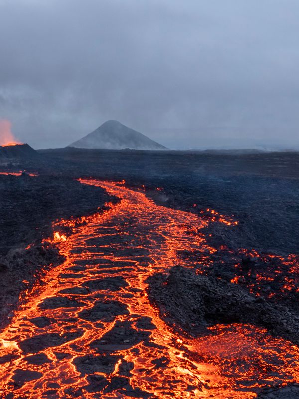 a volcano is erupting and lava is coming out of it, Iceland
