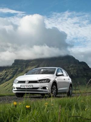 Volkswagen Polo rental car parked in the stunning Icelandic landscape. Journey through the beauty of Iceland with our reliable and stylish Volkswagen Polo rental car.