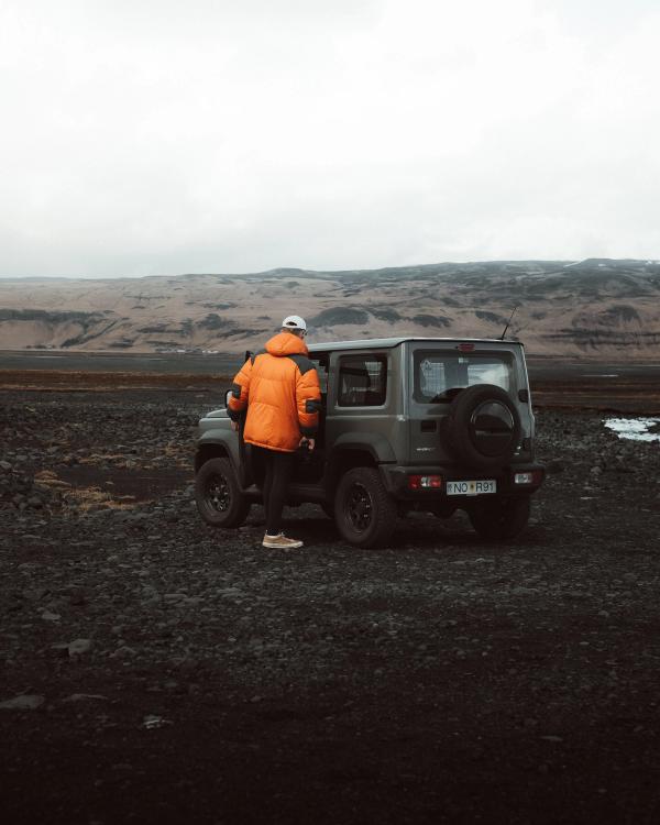Car overlooking stunning Icelandic landscape