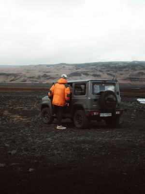 Exploring Iceland with a Rental Car Car overlooking stunning Icelandic landscape