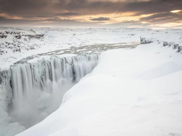 Dettifoss Waterfall completely covered in snow