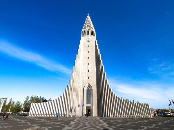 a large building with a clock tower on top of it .