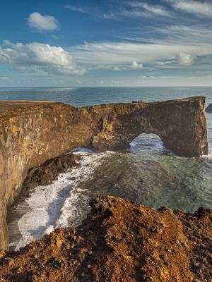 Dyrholaey Peninsula, Iceland Unique basalt arch on Dyrholaey cape in south Iceland