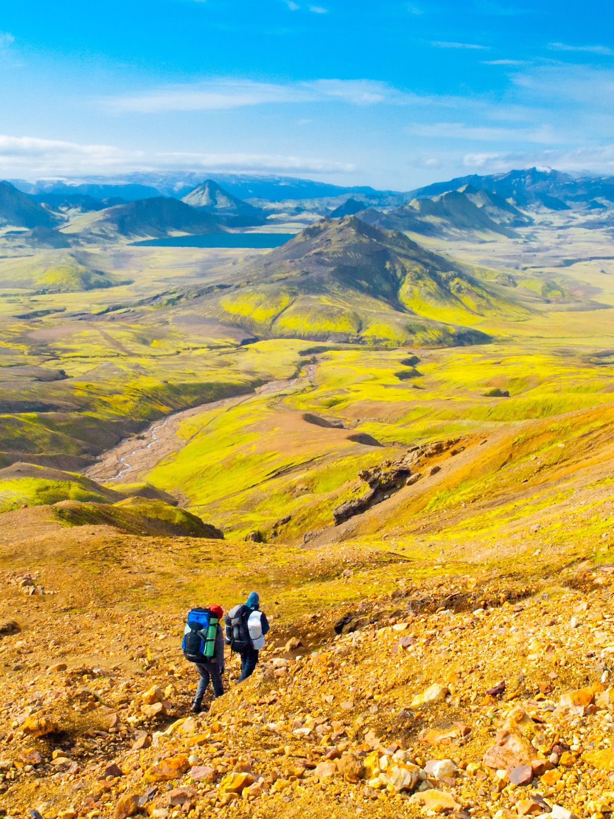 Two people hiking in Landmannalaugar during summer