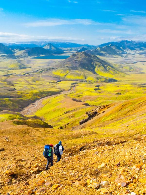 Two people hiking in Landmannalaugar during summer