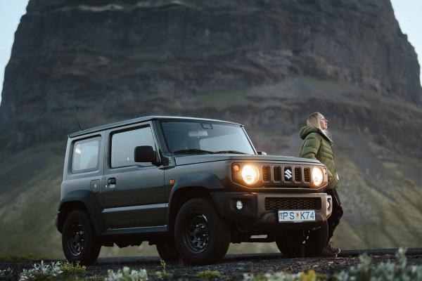 4x4 rental car A woman Iceland in September, enjoying iceland nature her her 4x4 rental car