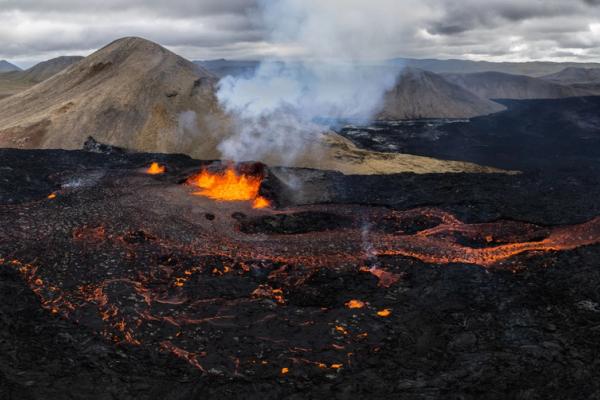 Meradalir A view of famous volcanoes, Meradalir valley with volcanic activity in the background
