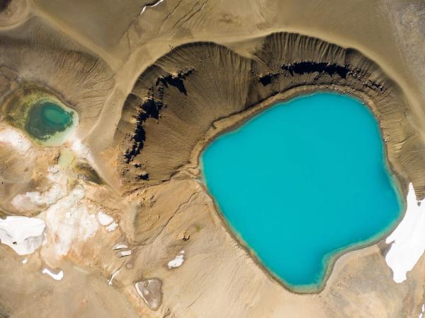 Aerial view of small volcanic Krafla lake with azure water,Iceland