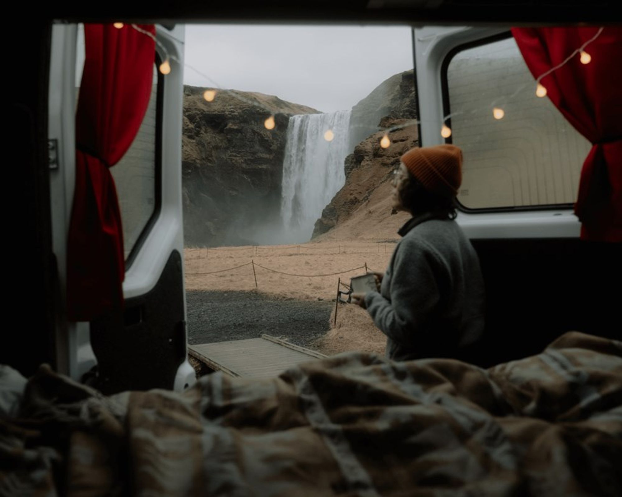 Camping in iceland by a waterfall.