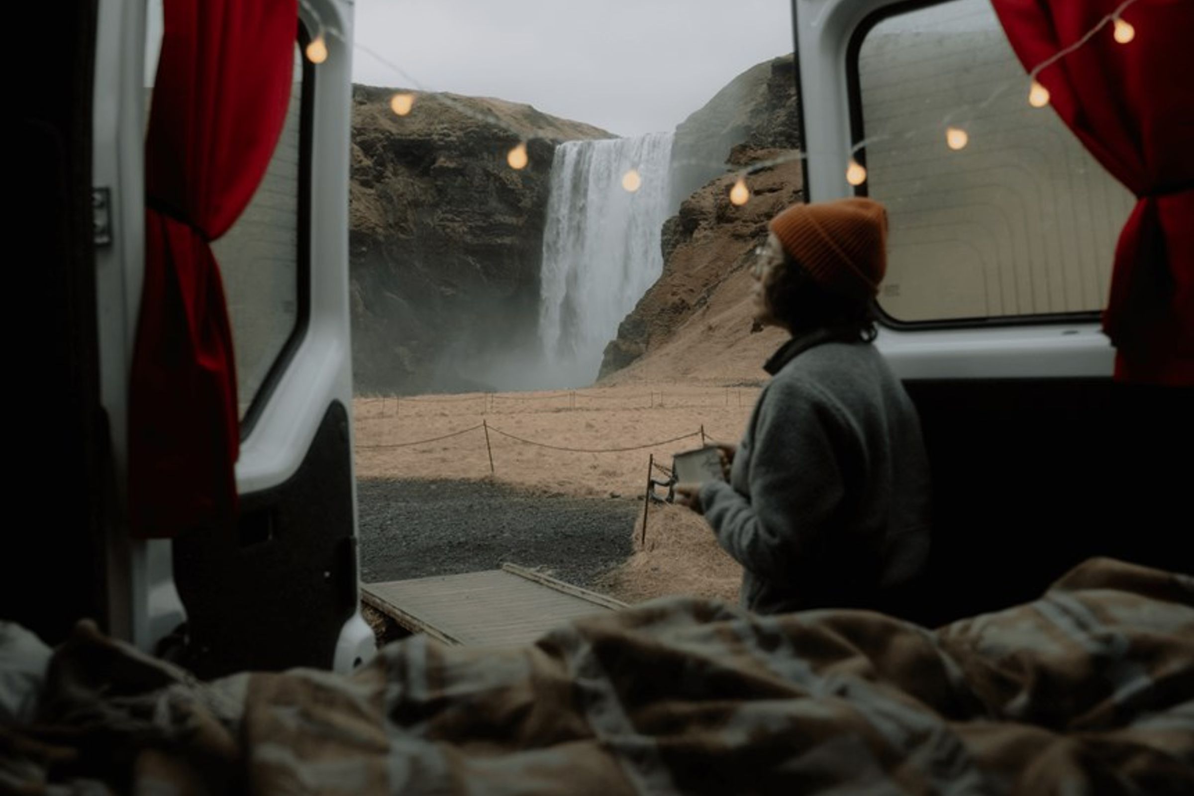 Camping in iceland by a waterfall.