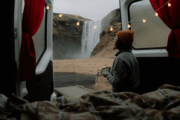 Camping in iceland by a waterfall.