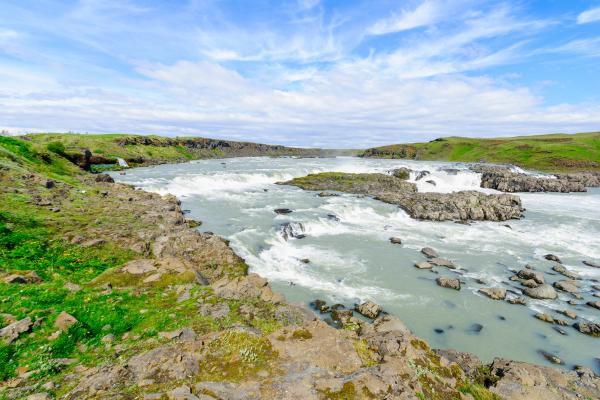 a low waterfall on a clear day