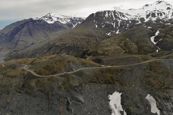 F985 – Jökulvegur in Icelandic mountain Aerial view of mountain road F985 leading to Joklasel and the Skalafellsjokull glacier, part of Vatnajökull National Park, Iceland. Panoramic landscape shot by drone camera.