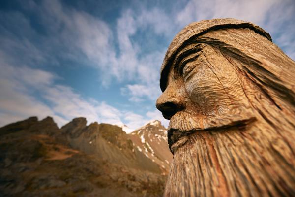 Wooden Viking, Iceland view on a wooden viking and the mountains of iceland in the background