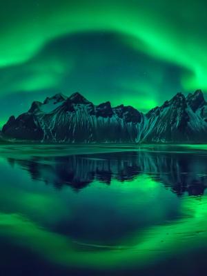 Stokksnes Black Sand Beach, Iceland Vestrahorn at night during northern lights