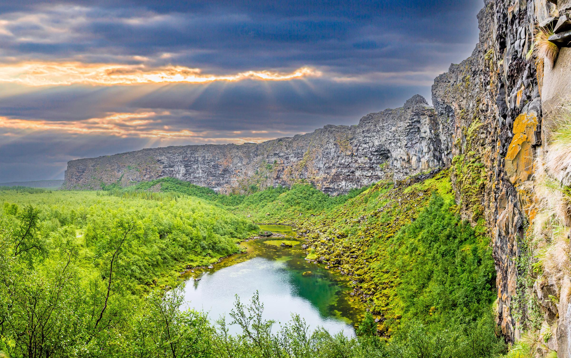 Cliffs with a pond at their base