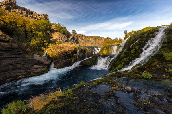 Waterfalls on a green valley