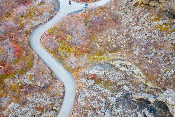 aerial view of a path in Dimmuborgir lava field with a person on it