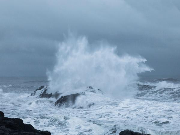 Waves crushing with a rock in Iceland