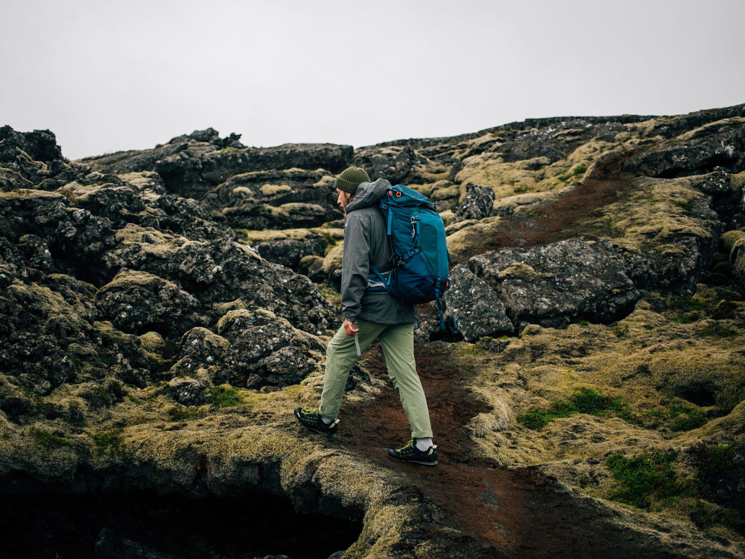Hiker with waterproof clothes and hat in Iceland