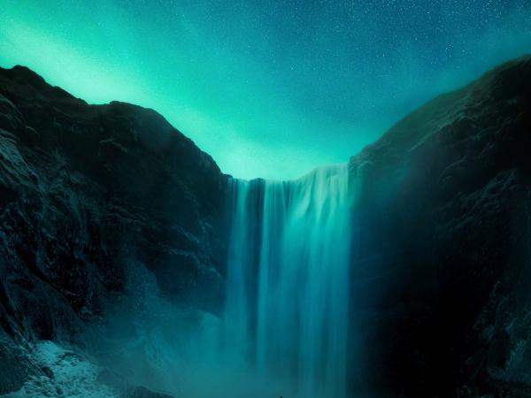 Skogafoss with the Northern Lights