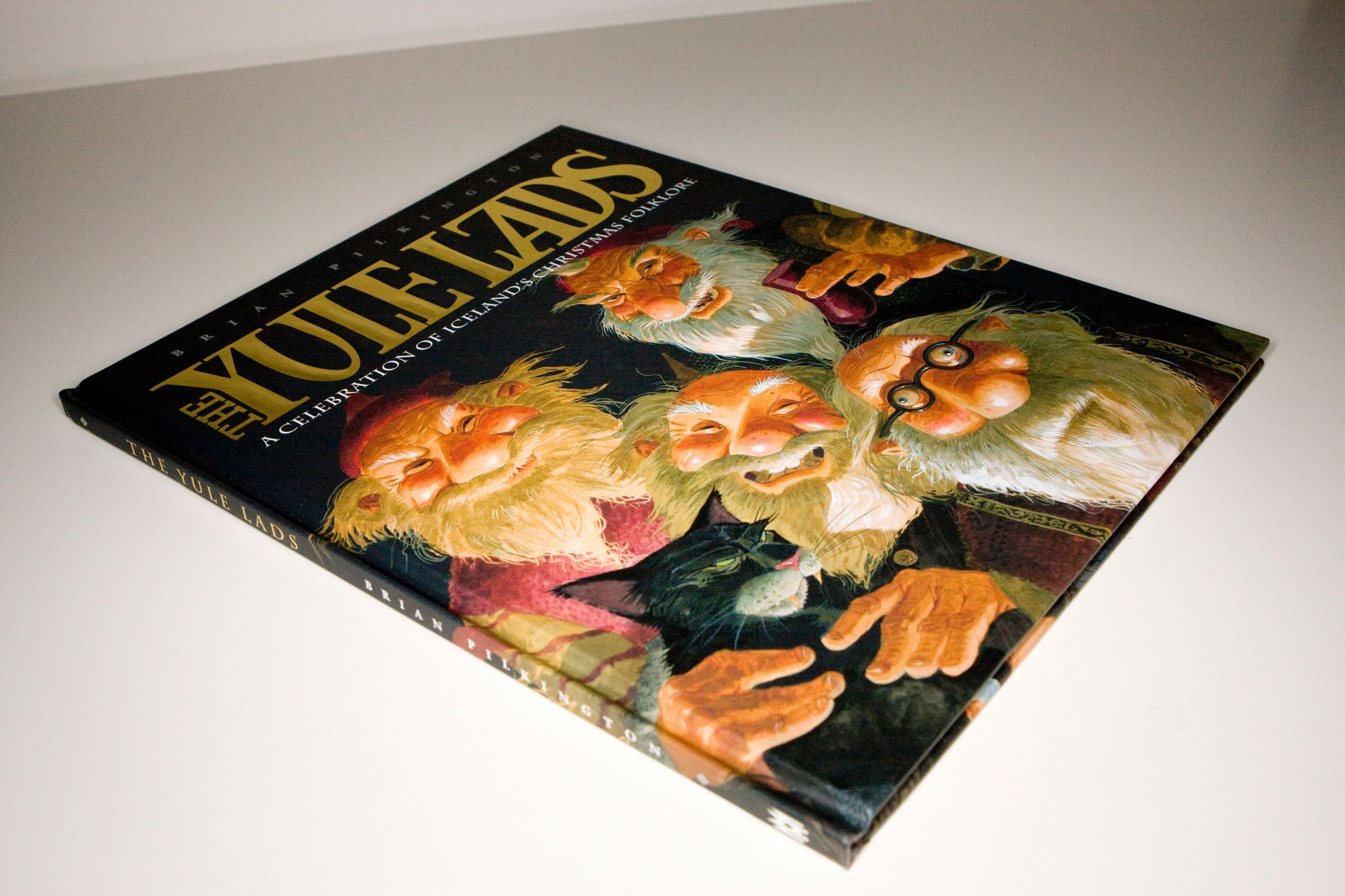 a book called the yule lads is on a table
