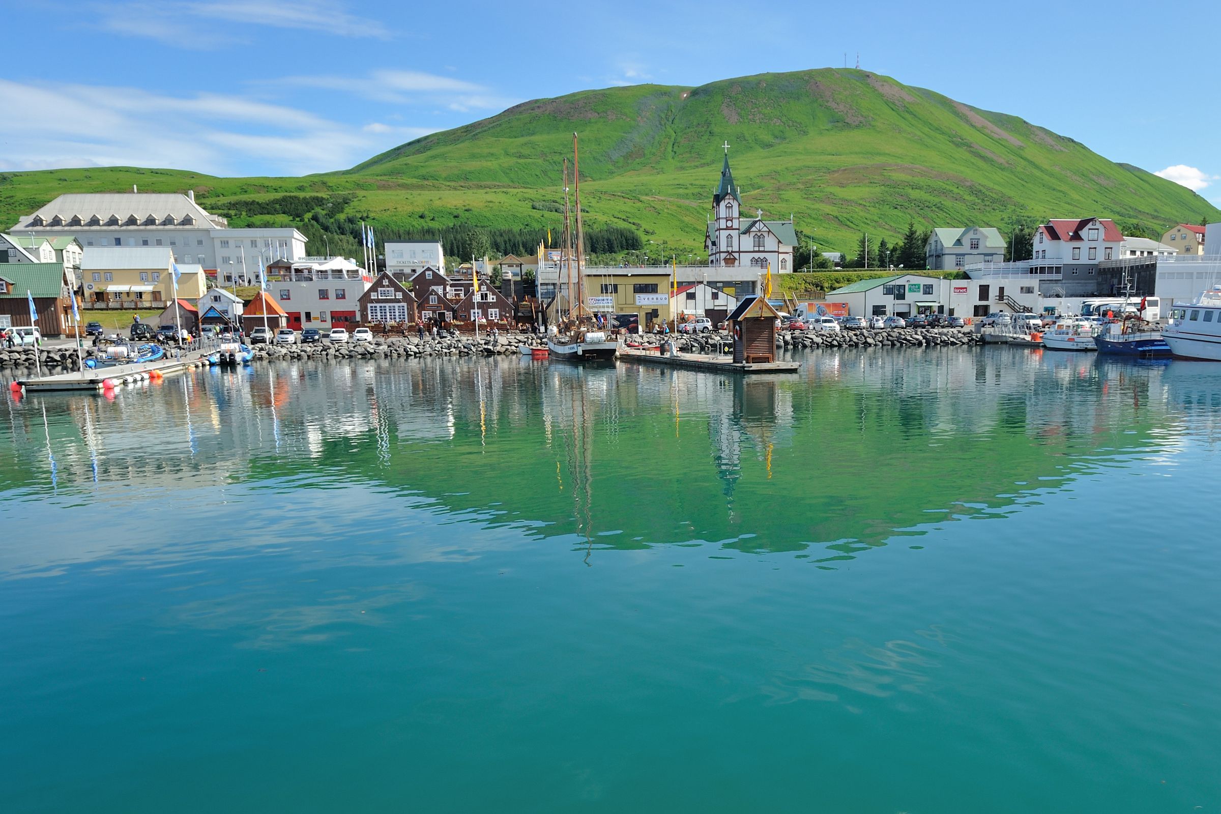 a fishing town with traditional wooden houses