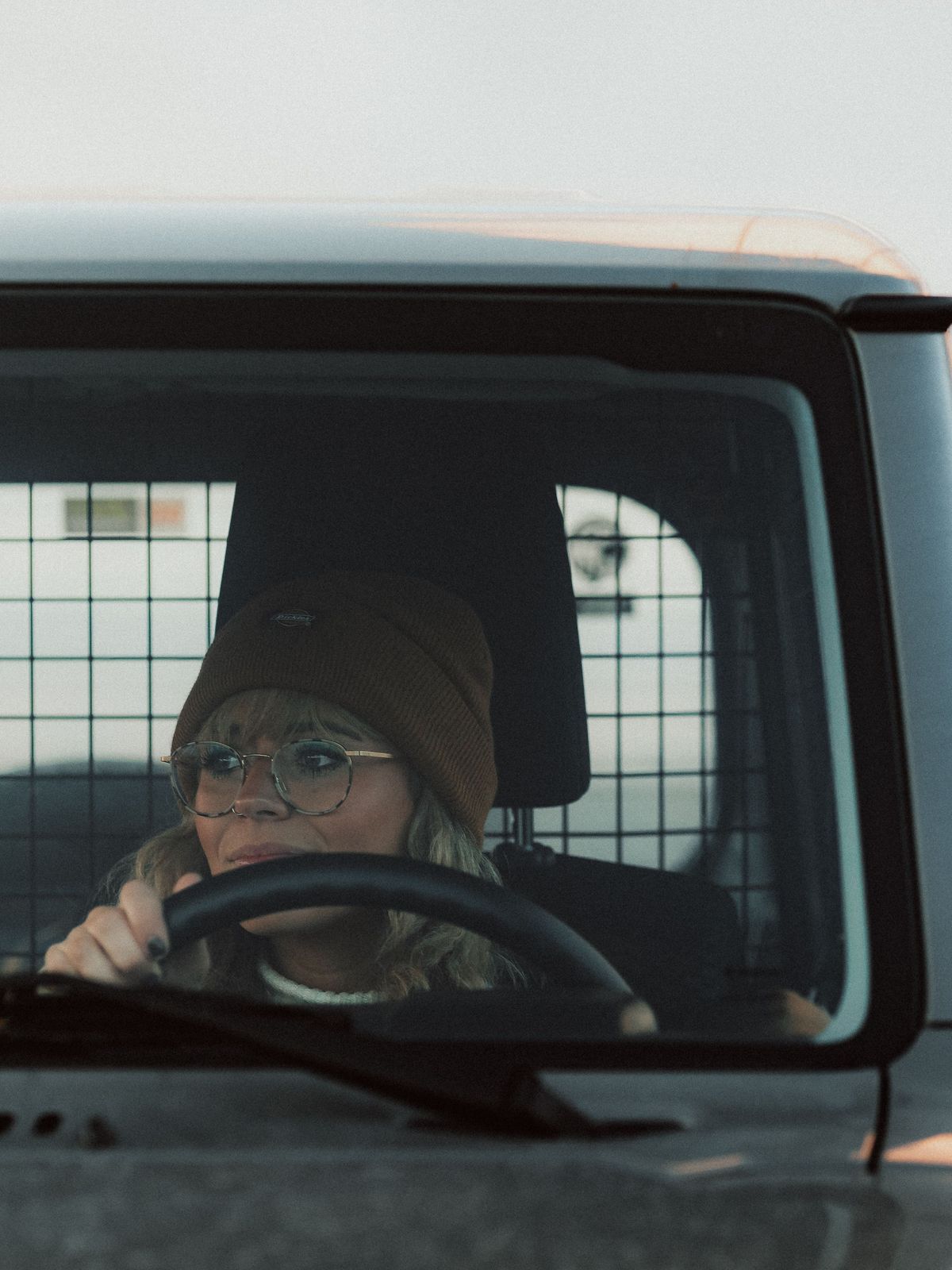 Rental Car Woman visiting places in iceland with her rental car
