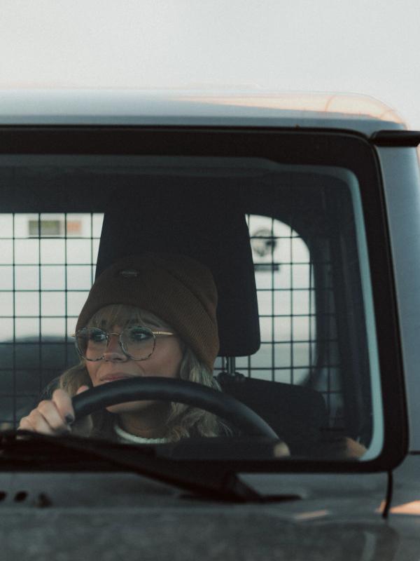 Rental Car Woman visiting places in iceland with her rental car