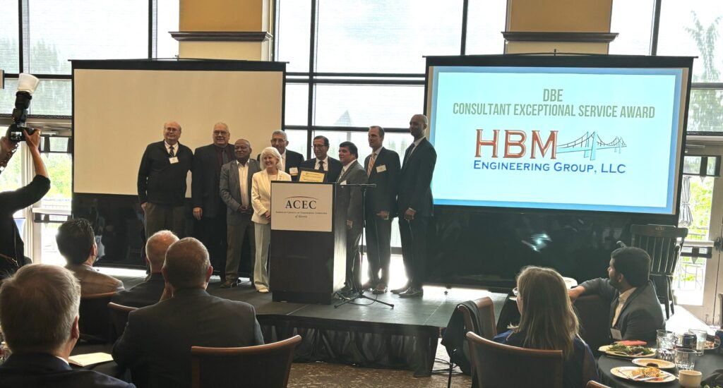 HBM Engineering Group accepting the DBE Consultant Exceptional Service Award at the ACEC-IL ceremony