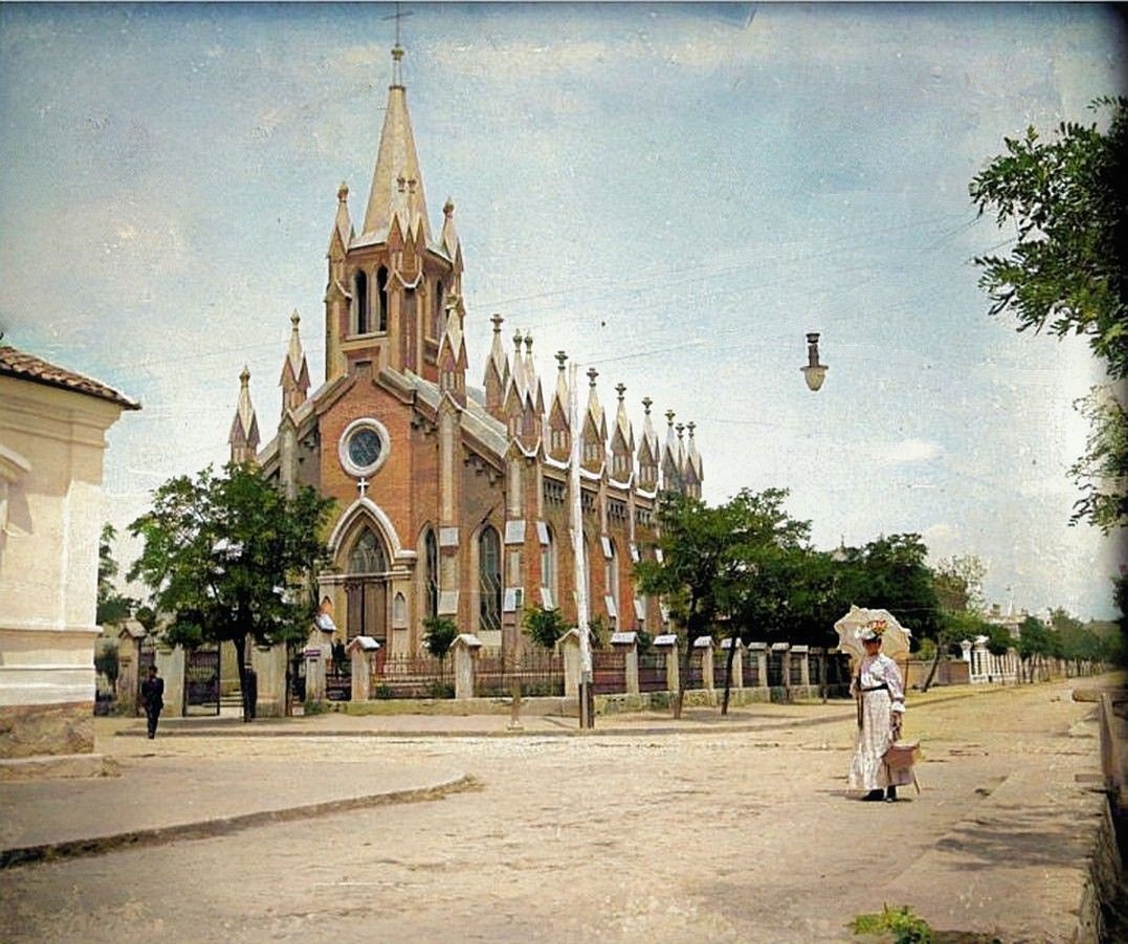 The Lutheran Church of Christ the Savior (Berdyansk). This glass-plate photograph was taken by amateur photographer Nikolai Vechersky while he was accompanying Alexandra Savitskaya and her father, Yan Savitsky—who was directly involved in the furnishing and interior design of the Livadia Palace—on a journey from Yalta to the southern provinces of the Russian Empire located within the territory of present-day Ukraine.