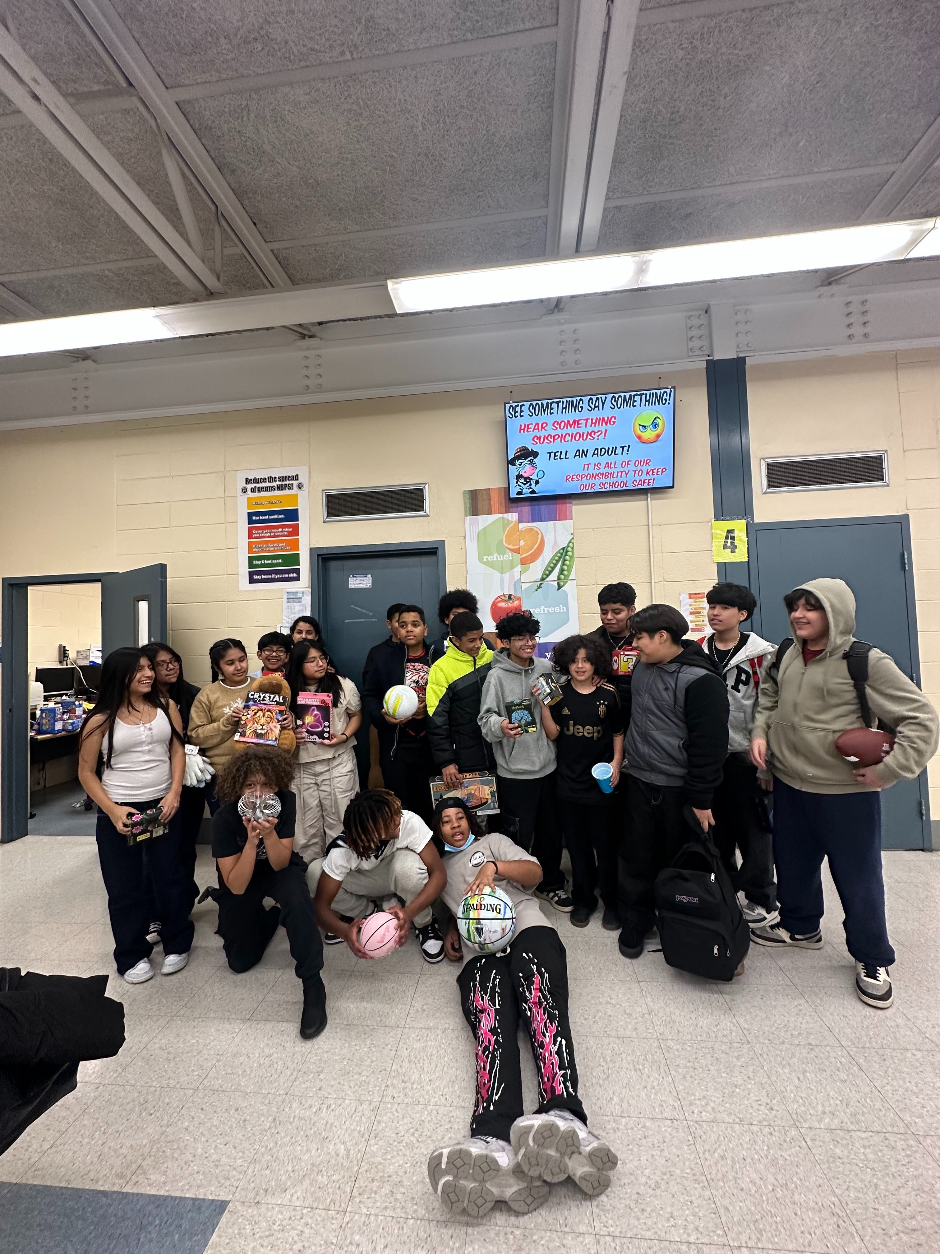 Students with gifts collected for the Civic League Toy Drive