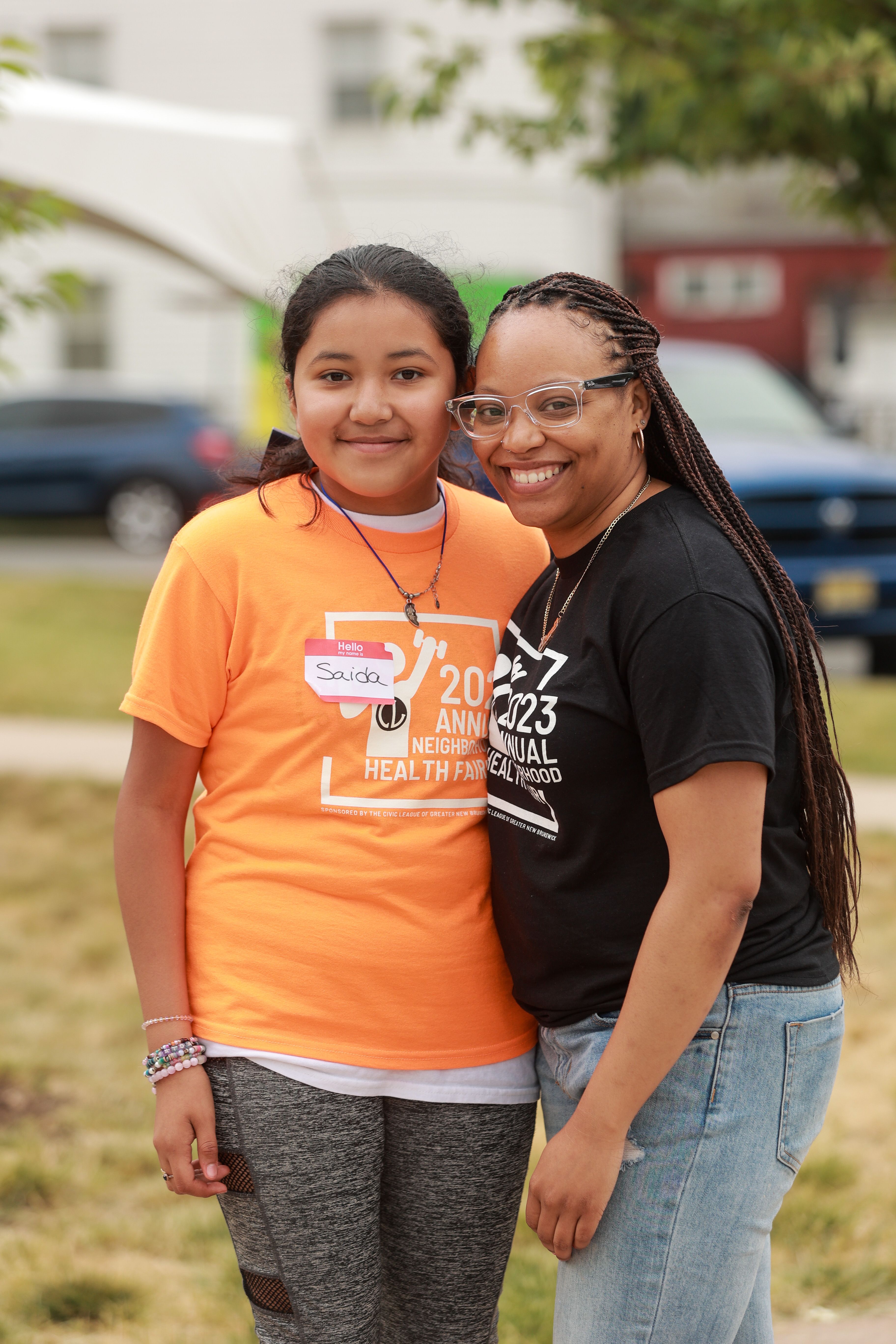 A student and mentor at the Civic League Health Fair