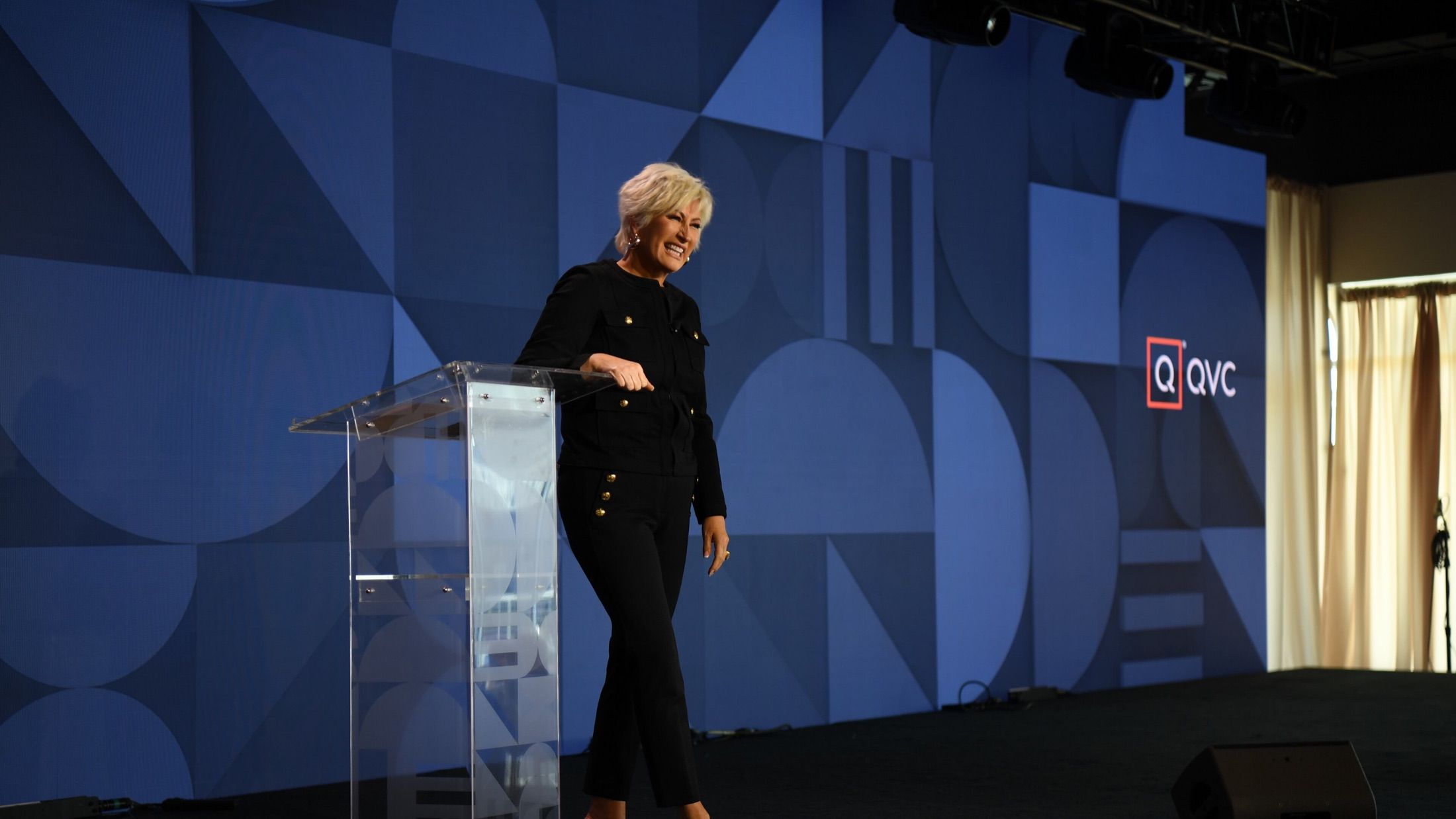 Kim Gravel speaking on the QVC stage